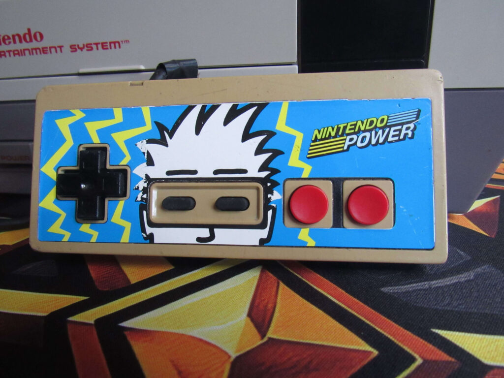 nintendo controller with nintendo power sticker